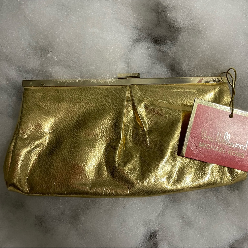 Excellent clutch by Michael Kors